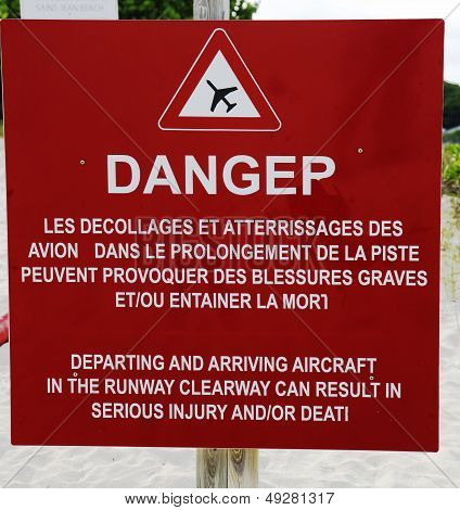 Danger sign next to runway at St Barts  Gustaf III Airport, French West Indies