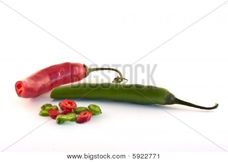 Cut Peppers Isolated On White Background