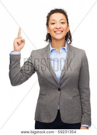 business and advertisement concept - attractive young woman with her finger up