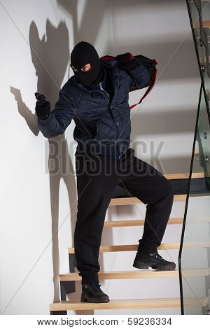Armed Robber On Stairs