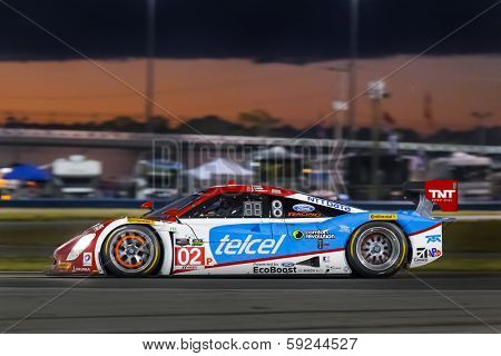 Daytona Beach, FL - Jan 25, 2014:  The Telcel Ford EcoBoost travels through the turns during Rolex 24 at Daytona at Daytona International Speedway in Daytona Beach, FL.