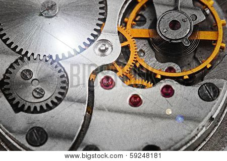 Clockwork details, pinions and wheels closeup