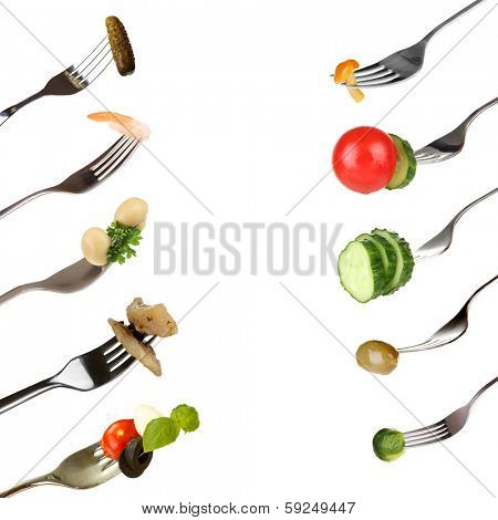 Collage of food on forks isolated on white