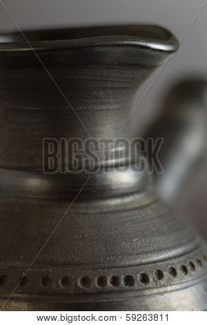 Part Of Ceramic Cezve. Close Up Photo. Selective Focus.