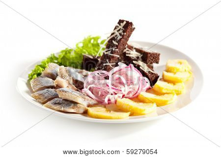 Herring Served with Potato, Onions and Bried Sticks