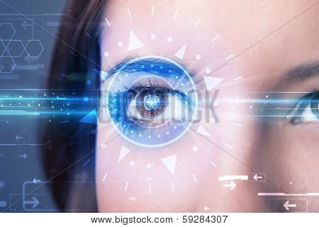 Modern cyber girl with technolgy eye looking into blue iris