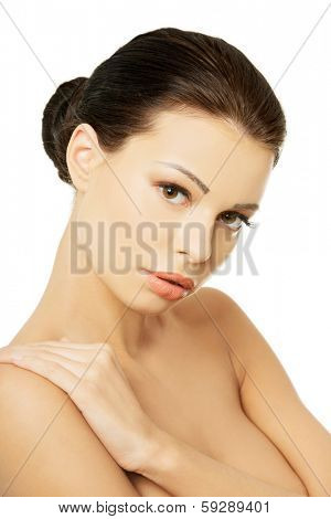 Baeutiful young woman portrait with healthy clean skin, isolated on white 