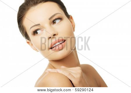 Baeutiful young woman portrait with healthy clean skin, isolated on white 