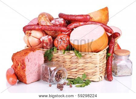 Lot of different sausages in basket isolated on white