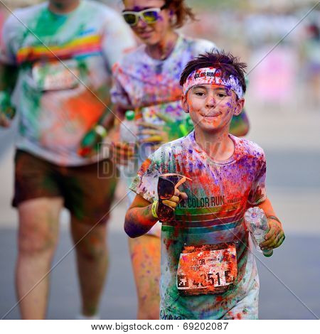 MAMAIA, CONSTANTA, ROMANIA - JULY 26: Mamaia color run 2014, in Mamaia, Constanta, on July 26, 2014. People from all walks of life participating in the fun summer run