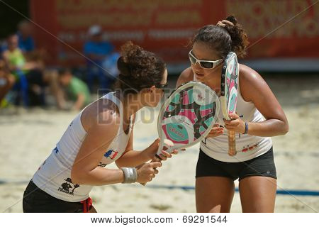 MOSCOW, RUSSIA - JULY 19, 2014: Woman double of France in the match against Belarus during ITF Beach Tennis World Team Championship. France won in two sets