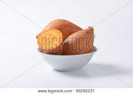 bowl of batata sweet potatoes on white background