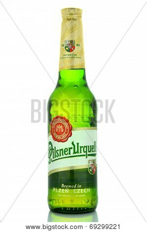 Pilsner Urquell pale lager beer isolated on white