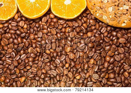 Whole Wheat Bread And  Pieces Orange On Roasted Coffee