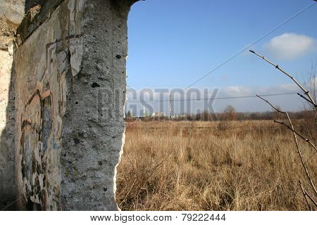 Viev on ruins of old castle hidden in forest