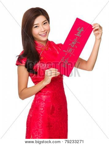 Woman hold with Fai Chun, phrase meaning is business prospers 