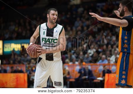 VALENCIA, SPAIN - DECEMBER 30: Miralles with ball during Spanish League match between Valencia Basket Club and Juventut at Fonteta Stadium on December 30, 2014 in Valencia, Spain