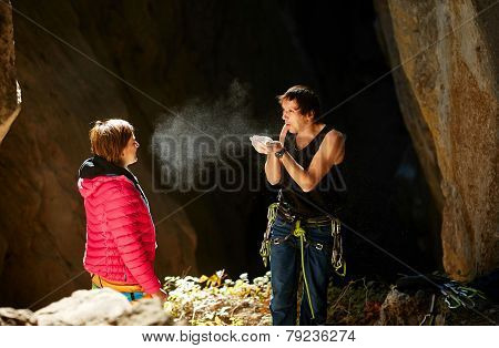 two climbers in a cave