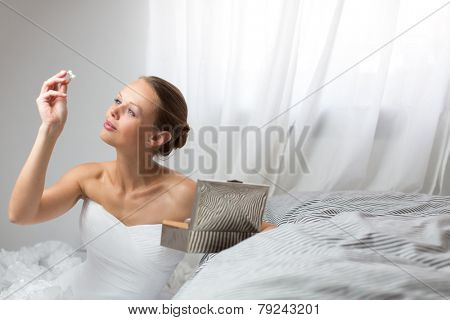 Beautiful bride getting ready for her wedding day