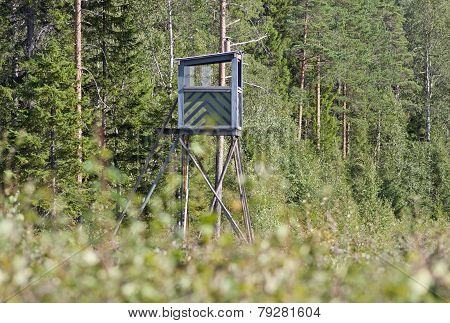 Hunting tower in a forest.