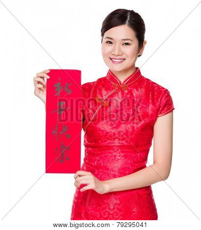 Woman with traditional cheongsam and holding Fai Chun, phrase meaning is happy new year 