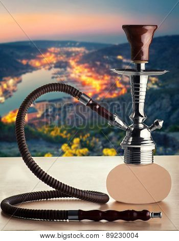 Hookah On A Table On The Background Of Night City