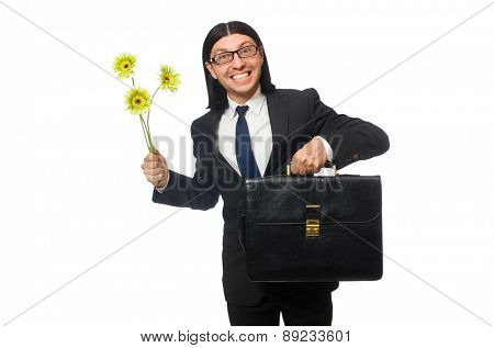 Handsome businessman with flower and brief case isolated on white