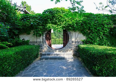 Old door with arch, yuyuan garden shanghai china.