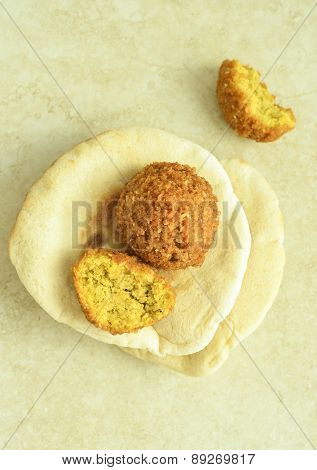 Fried falafel and pita bread - a popular middle eastern food.