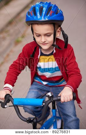 Young boy on the bicycle at Park
