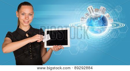 Young woman holging blank card and tablet