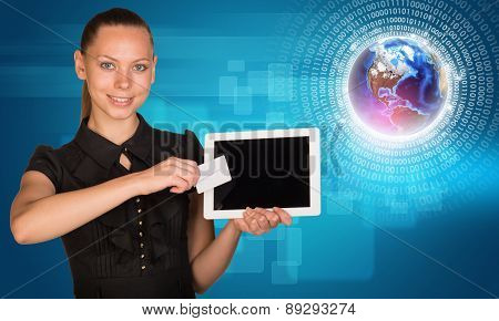 Businesswoman with 3d Earth model