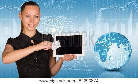 Young woman holging tablet and blank card