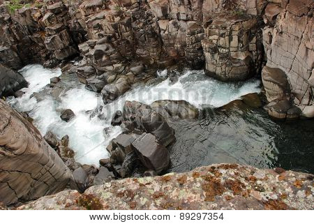 Waterfall In The Rocks