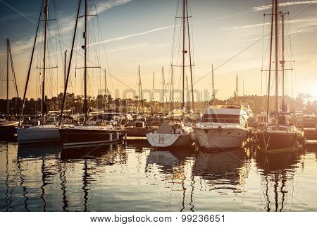 tiful scenery of yachts in a berth with blue clear see and sky background