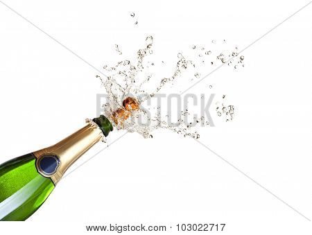 detail of popping champagne on black background