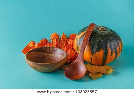 Colored Pumpkin On Aquamarine Shadowless Background