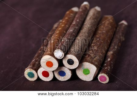 decorative pencil on a brown background