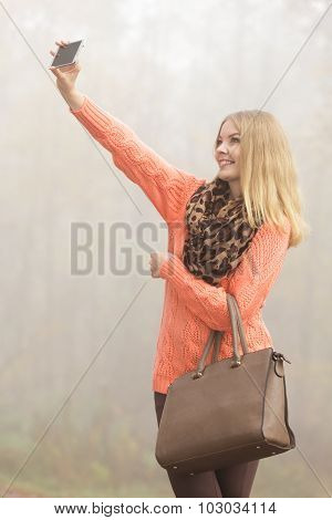 Lovely Fashion Woman In Park Taking Selfie Photo.