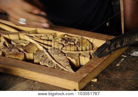 Malaysian traditional wood carving in progress