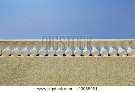 Vintage style railing on the roof. View from below.