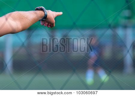 Kids Soccer Coach On Football Pitch