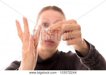 Woman Shows Her Sticky Hands With Cobwebby Fingers, Isolated On White