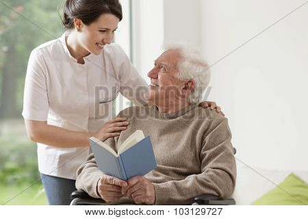 Elderly Man Reading Book