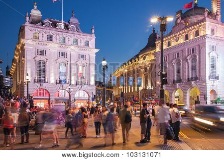 LONDON, UK - AUGUST 22, 2015: Piccadilly Circus in night. Famous place for romantic dates. Square wa