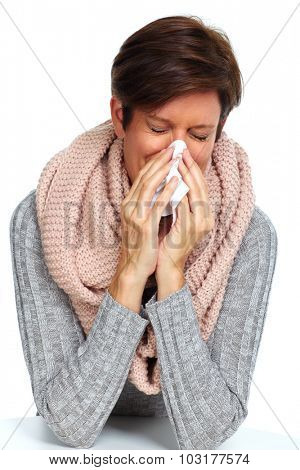Woman with facial tissue having rheum. Health care.