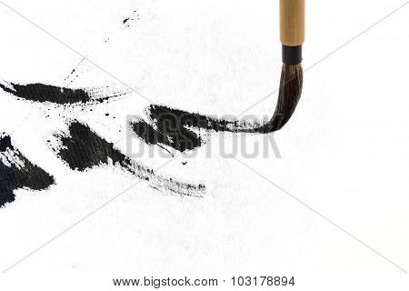 Chinese brushes draw on white papers