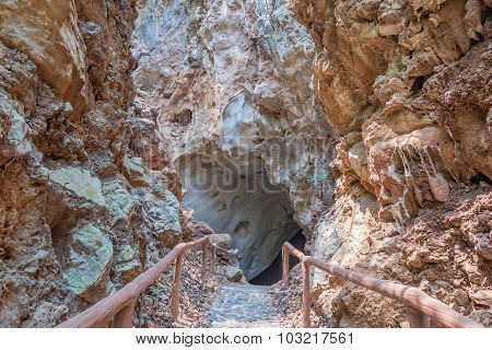 Pathway Underground Cave With Stalagmites And Stalactites