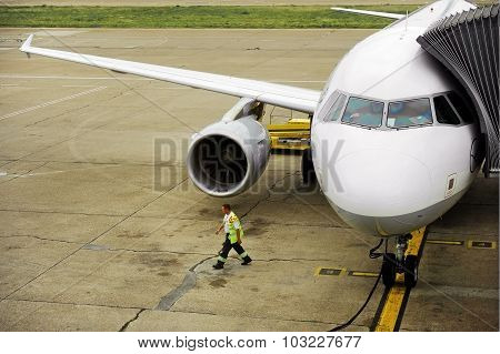 Airplane Connected To Jetway