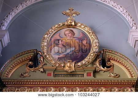 ZAGREB, CROATIA - MAY 28: Guardian angel, altarpiece in the Basilica of the Sacred Heart of Jesus in Zagreb, Croatia on May 28, 2015